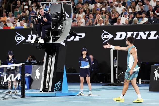 Carlos Alcaraz complains to the umpire about a late call on a let during his Quarter-final match against Djokovic in the Rod Laver Arena Australian Open, Day Ten, Tennis, Melbourne Park, Melbourne, Australia - 21 Jan 2025  Copyright: xEllaxLing Shutterstockx 15108779bf