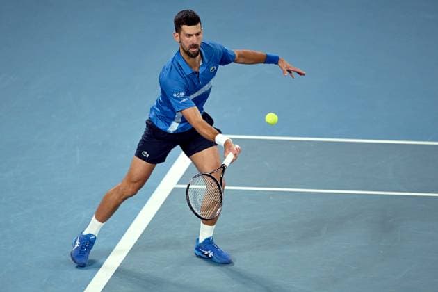 TENNIS AUSTRALIAN OPEN, Novak Djokovic of Serbia during his 1 4 final match against Carlos Alcaraz of Spain during the 2025 Australian Open at Melbourne Park in Melbourne, Tuesday, January 21, 2025. NO ARCHIVING, EDITORIAL USE ONLY, NO USE IN BOOKS WITHOUT CONSENT MELBOURNE VICTORIA AUSTRALIA  Copyright: xLUKASxCOCHx 20250121178221365500