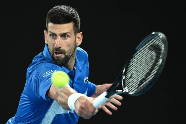 TENNIS AUSTRALIAN OPEN, Novak Djokovic of Serbia during his 1 4 final match against Carlos Alcaraz of Spain during the 2025 Australian Open at Melbourne Park in Melbourne, Tuesday, January 21, 2025. ( NO ARCHIVING, EDITORIAL USE ONLY, NO USE IN BOOKS WITHOUT CONSENT MELBOURNE VICTORIA AUSTRALIA  Copyright: xJOELxCARRETTx 20250121128631400637