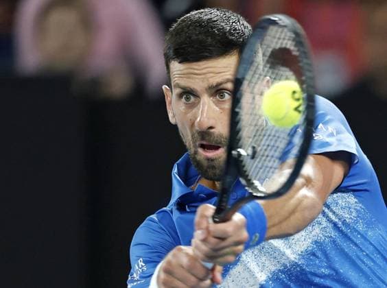 Tennis: Australian Open Novak Djokovic of Serbia plays against Carlos Alcaraz of Spain in the men s singles quarterfinals at the Australian Open tennis tournament in Melbourne on Jan. 21, 2025.  A14AA0004021009P