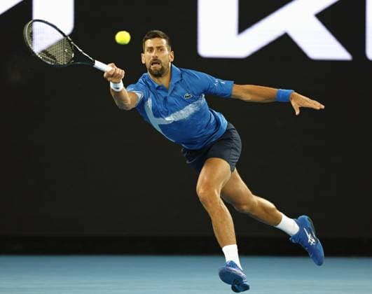 Tennis: Australian Open Novak Djokovic of Serbia plays against Carlos Alcaraz of Spain in the men s singles quarterfinals at the Australian Open tennis tournament in Melbourne on Jan. 21, 2025.  A14AA0004021037P
