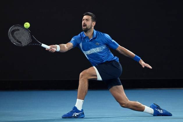 TENNIS AUSTRALIAN OPEN, Novak Djokovic of Serbia reacts during his 1 4 final match against Carlos Alcaraz of Spain during the 2025 Australian Open at Melbourne Park in Melbourne, Tuesday, January 21, 2025. ( NO ARCHIVING, EDITORIAL USE ONLY, NO USE IN BOOKS WITHOUT CONSENT MELBOURNE VICTORIA AUSTRALIA  Copyright: xJOELxCARRETTx 20250121146253439818