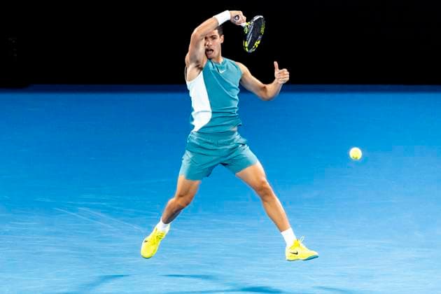 MELBOURNE, VIC - JANUARY 21: Carlos Alcaraz of Spain in action during the Quarterfinals of the 2025 Australian Open on January 21 2025, at Melbourne Park in Melbourne, Australia. (Photo by Jason Heidrich Icon Sportswire) TENNIS: JAN 21 Australian Open EDITORIAL USE ONLY Icon250121244