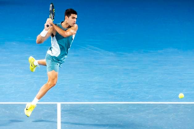 MELBOURNE, VIC - JANUARY 21: Carlos Alcaraz of Spain in action during the Quarterfinals of the 2025 Australian Open on January 21 2025, at Melbourne Park in Melbourne, Australia. (Photo by Jason Heidrich Icon Sportswire) TENNIS: JAN 21 Australian Open EDITORIAL USE ONLY Icon250121247