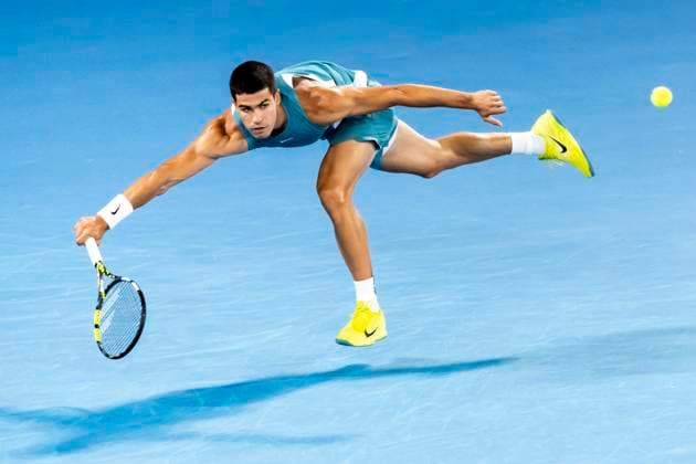 MELBOURNE, VIC - JANUARY 21: Carlos Alcaraz of Spain in action during the Quarterfinals of the 2025 Australian Open on January 21 2025, at Melbourne Park in Melbourne, Australia. (Photo by Jason Heidrich Icon Sportswire) TENNIS: JAN 21 Australian Open EDITORIAL USE ONLY Icon250121257