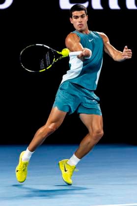 MELBOURNE, VIC - JANUARY 21: Carlos Alcaraz of Spain in action during the Quarterfinals of the 2025 Australian Open on January 21 2025, at Melbourne Park in Melbourne, Australia. (Photo by Jason Heidrich Icon Sportswire) TENNIS: JAN 21 Australian Open EDITORIAL USE ONLY Icon250121267