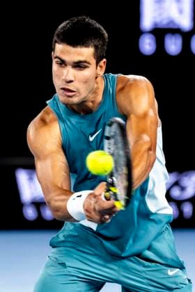 MELBOURNE, VIC - JANUARY 21: Carlos Alcaraz of Spain in action during the Quarterfinals of the 2025 Australian Open on January 21 2025, at Melbourne Park in Melbourne, Australia. (Photo by Jason Heidrich Icon Sportswire) TENNIS: JAN 21 Australian Open EDITORIAL USE ONLY Icon250121274
