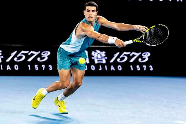 MELBOURNE, VIC - JANUARY 21: Carlos Alcaraz of Spain in action during the Quarterfinals of the 2025 Australian Open on January 21 2025, at Melbourne Park in Melbourne, Australia. (Photo by Jason Heidrich Icon Sportswire) TENNIS: JAN 21 Australian Open EDITORIAL USE ONLY Icon250121286