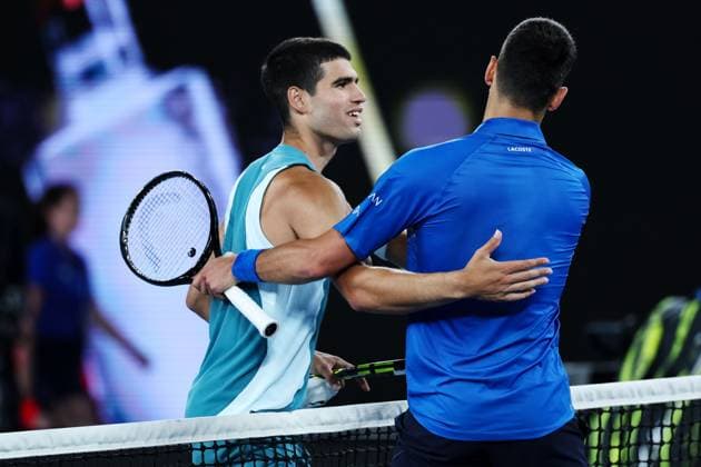 Novak Djokovic and Carlos Alcaraz meet at the net after their Quarter-final match in the Rod Laver Arena Australian Open, Day Ten, Tennis, Melbourne Park, Melbourne, Australia - 21 Jan 2025  Copyright: xEllaxLing Shutterstockx 15108779ft