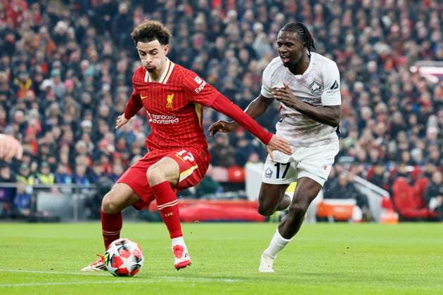 Liverpool FC v LOSC Lille - UEFA Champions League 2024 25 League Phase MD7 Curtis Jones of Liverpool and Ngal ayel Mukau of LOSC Lille challenge during the UEFA Champions League 2024 25 League Phase MD7 match between Liverpool FC and LOSC Lille at Anfield on January 21, 2025 in Liverpool, England. Liverpool Anfield England United Kingdom Copyright: xRichardxSellers Sportsphoto APLx 14057442