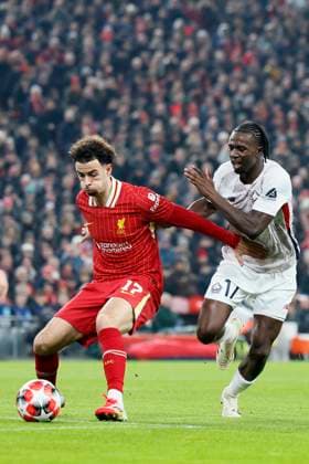 Liverpool FC v LOSC Lille - UEFA Champions League 2024 25 League Phase MD7 Curtis Jones of Liverpool and Ngal ayel Mukau of LOSC Lille challenge during the UEFA Champions League 2024 25 League Phase MD7 match between Liverpool FC and LOSC Lille at Anfield on January 21, 2025 in Liverpool, England. Liverpool Anfield England United Kingdom Copyright: xRichardxSellers Sportsphoto APLx 14057443
