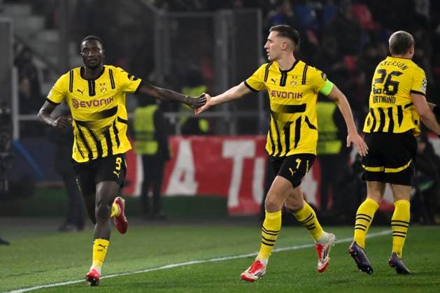 Serhou Guirassy of Borussia Dortmund celebrates with Nico Schlotterbeck after scoring the goal of 0-1 during the Champions League football match between Bologna FC and Borussia Dortmund at Renato Dall Ara stadium in Bologna (Italy), January 21, 2025. andreaxstaccioli