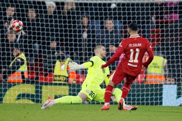 Liverpool FC v LOSC Lille - UEFA Champions League 2024 25 League Phase MD7 Mohamed Salah of Liverpool scores 1st goal past Lucas Chevalier goalkeeper of LOSC Lille during the UEFA Champions League 2024 25 League Phase MD7 match between Liverpool FC and LOSC Lille at Anfield on January 21, 2025 in Liverpool, England. Liverpool Anfield England United Kingdom Copyright: xRichardxSellers Sportsphoto APLx 14057451