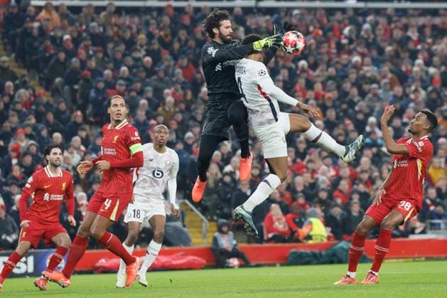 Liverpool FC v LOSC Lille - UEFA Champions League 2024 25 League Phase MD7 Alisson Becker, goalkeeper of Liverpool and Alexsandro of LOSC Lille challenge during the UEFA Champions League 2024 25 League Phase MD7 match between Liverpool FC and LOSC Lille at Anfield on January 21, 2025 in Liverpool, England. Liverpool Anfield England United Kingdom Copyright: xRichardxSellers Sportsphoto APLx 14057457