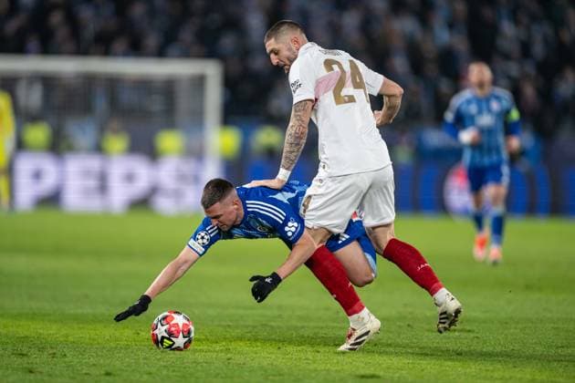Robert Mak in a hard battle with Jeff Chabot during UEFA Champions league match, SK Slovan Bratislava - VFB Stuttgart , 21. january 2025, Tehelne pole Stadium, Bratislava, Slovakia Copyright: xMICHALxFAJT,ZOSPORTU.SKx FAJ_7597