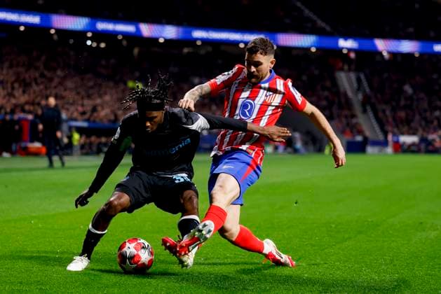 Jeremie Frimpong Bayer 04 Leverkusen and Javi Galan Atletico Madrid battle for the ball during the UEFA Champions League 2024 25 League Phase MD7 match between Atletico de Madrid and Bayer 04 Leverkusen at Estadio Civitas Metropolitano on January 21, 2025 in Madrid, Spain Photo by Manu Reino DeFodi Images Defodi 071 ATMLEV20250121 063 Defodi-071