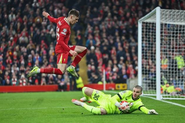 UEFA Champions League - League Stage Liverpool v Lille Lucas Chevalier of Lille save at the feet of Conor Bradley of Liverpool during the UEFA Champions League - League Stage Liverpool v Lille at Anfield, Liverpool, United Kingdom, 21st January 2025 (Photo by Mark Cosgrove News Images) Copyright: xMarkxCosgrove NewsxImagesx