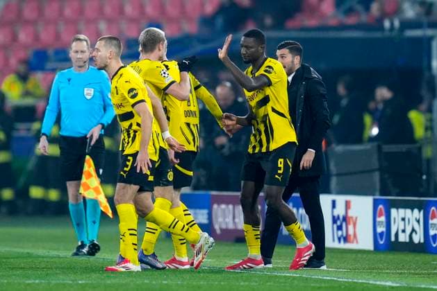 Serhou Guirassy of Borussia Dortmund celebrates with team mates after scoring during the Uefa Champions League match between Bologna FC and Borussia Dortmund at Stadio Renato Dall Ara Bologna Italy on 21 January 2025. Bologna Stadio Renato Dall Ara Bologna Italy Copyright: xPhotoxGoalxPixx SP24-1103-006