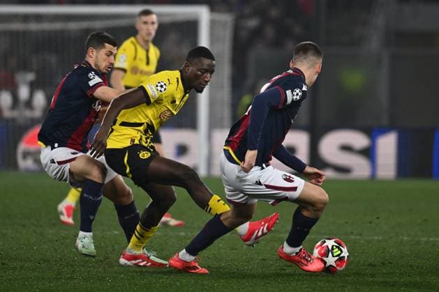 Remo Freuler of Bologna F.C. and Serhou Guirassy of Borussia Dortmund are in action during the 7st day of the UEFA Champions League between Bologna F.C. and Borussia Dortmund at the Renato Dall Ara Stadium on January 21, 2025 in Bologna, Italy.  Copyright: xDomenicoxCippitelli IPAxSportx xipa-agency.netx xx IPA_53202462 IPA_Agency_IPA53202462