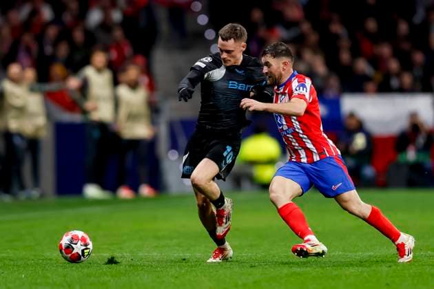 Florian Wirtz Bayer 04 Leverkusen and Javi Galan Atletico Madrid battle for the ball during the UEFA Champions League 2024 25 League Phase MD7 match between Atletico de Madrid and Bayer 04 Leverkusen at Estadio Civitas Metropolitano on January 21, 2025 in Madrid, Spain Photo by Manu Reino DeFodi Images Defodi 071 ATMLEV20250121 091 Defodi-071