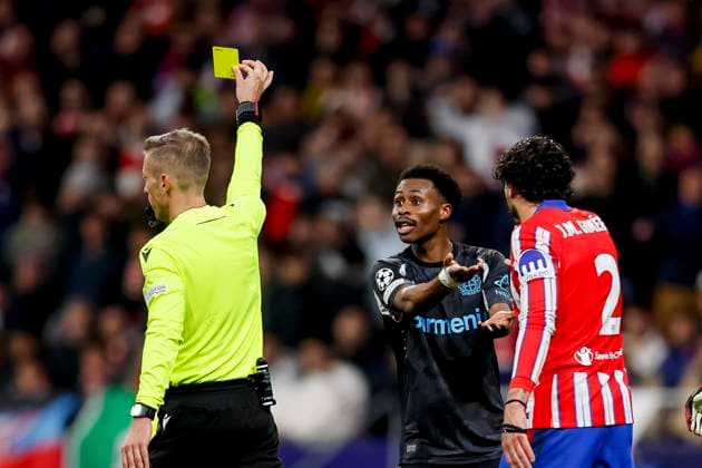 Referee Davide Massa show Nathan Tella Bayer 04 Leverkusen the yellow card during the UEFA Champions League 2024 25 League Phase MD7 match between Atletico de Madrid and Bayer 04 Leverkusen at Estadio Civitas Metropolitano on January 21, 2025 in Madrid, Spain Photo by Manu Reino DeFodi Images Defodi 071 ATMLEV20250121 102 Defodi-071