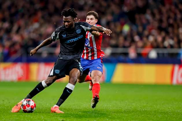Edmond Tapsoba Bayer 04 Leverkusen and Julian Alvarez Atletico Madrid battle for the ball during the UEFA Champions League 2024 25 League Phase MD7 match between Atletico de Madrid and Bayer 04 Leverkusen at Estadio Civitas Metropolitano on January 21, 2025 in Madrid, Spain Photo by Manu Reino DeFodi Images Defodi 071 ATMLEV20250121 111 Defodi-071