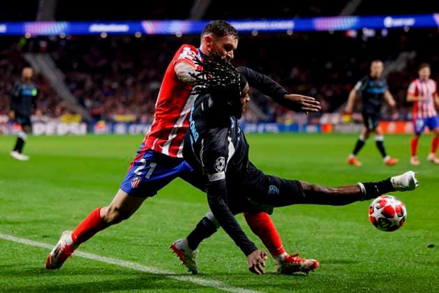 Javi Galan Atletico Madrid and Jeremie Frimpong Bayer 04 Leverkusen battle for the ball during the UEFA Champions League 2024 25 League Phase MD7 match between Atletico de Madrid and Bayer 04 Leverkusen at Estadio Civitas Metropolitano on January 21, 2025 in Madrid, Spain Photo by Manu Reino DeFodi Images Defodi 071 ATMLEV20250121 120 Defodi-071