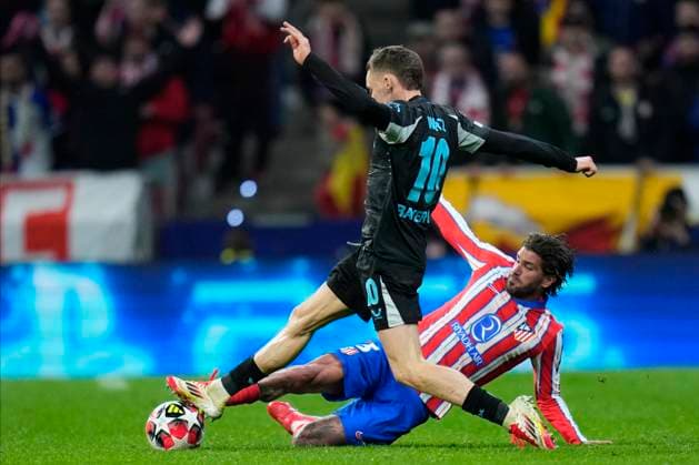 Champions League 2024 25 League match between Atletico de Madrid and Bayer Leverkusen Florian Wirtz of Bayer Leverkusen and Rodrigo De Paul of Atletico de Madrid during the UEFA Champions League 2024 25 League match between Atletico de Madrid and Bayer Leverkusen at Riyadh Air Metropolitano on December 11, 2024 in Madrid, Spain MadridSpain  Copyright: xx