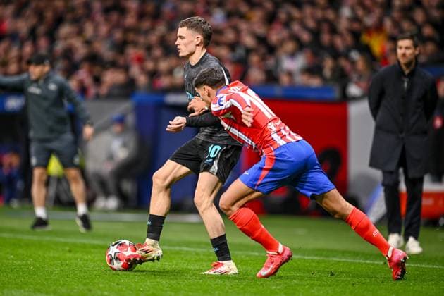 Florian Wirtz Bayer 04 Leverkusen and Nahuel Molina Atletico de Madrid battle for the ball during the UEFA Champions League 2024 25 League Phase MD7 match between Atletico de Madrid and Bayer 04 Leverkusen at Estadio Civitas Metropolitano on January 21, 2025 in Madrid, Spain Photo by Harry Langer DeFodi Images Defodi 541 ATLBAY20250121 054 Defodi-541