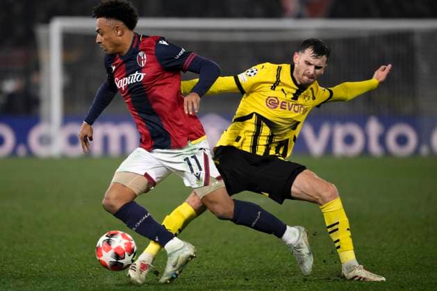 Dan Ndoye of Bologna FC and Pascal Gross of Borussia Dortmund compete for the ball during the Champions League football match between Bologna FC and Borussia Dortmund at Renato Dall Ara stadium in Bologna (Italy), January 21, 2025. andreaxstaccioli