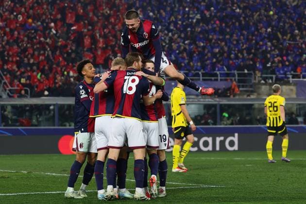 Samuel Iling Junior of Bologna FC celebrates with team mates after scoring the goal of 2-1 during the Champions League football match between Bologna FC and Borussia Dortmund at Renato Dall Ara stadium in Bologna (Italy), January 21st, 2025. cesarexpurini