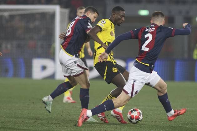 CALCIO - UEFA Champions League - Bologna FC vs Borussia Dortmund Serhou Guirassy of Borussia Dortmund battle for the ball with Remo Freuler of Bologna FC and Emil Holm of Bologna FC during Bologna BFC vs Borussia Dortmund, 7Â° round of Chanpions League 2024-25, game at Renato Dall Ara stadiumo in Bologna (BG), Italy, on January 21, 2024. Bologna Italy  Copyright: xIPAxSport ABACAx
