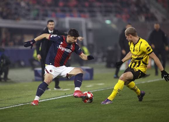 CALCIO - UEFA Champions League - Bologna FC vs Borussia Dortmund Riccardo Orsolini of Bologna FC and Julian Ryerson of Borussia Dortmund during the IUefa Champions League, 2024 25 season, football match between Bologna FC 1909 and Borussia Dortmund on 21 January 2025 at Renato Dallâ??Ara Stadium, Bologna, Italy. Photo Nderim Kaceli Bologna Italy  Copyright: xIPAxSport ABACAx
