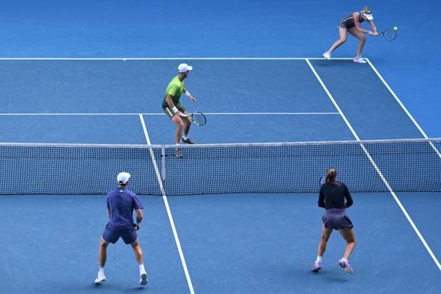 TENNIS AUSTRALIAN OPEN, Erin Routliffe and Michael Venus (top) of New Zealand during their Mixed doubles Semi-final match against Olivia Gadecki and John Peers during the 2025 Australian Open at Melbourne Park in Melbourne, Sunday, January 19, 2025. ( NO ARCHIVING, EDITORIAL USE ONLY, NO USE IN BOOKS WITHOUT CONSENT MELBOURNE VICTORIA AUSTRALIA  Copyright: xJOELxCARRETTx 20250122129378236605
