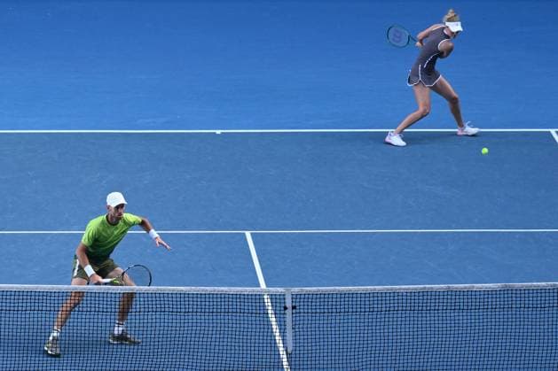 TENNIS AUSTRALIAN OPEN, Erin Routliffe (top) and Michael Venus of New Zealand during their Mixed doubles Semi-final match against Olivia Gadecki and John Peers during the 2025 Australian Open at Melbourne Park in Melbourne, Sunday, January 19, 2025. ( NO ARCHIVING, EDITORIAL USE ONLY, NO USE IN BOOKS WITHOUT CONSENT MELBOURNE VICTORIA AUSTRALIA  Copyright: xJOELxCARRETTx 20250122157658343338