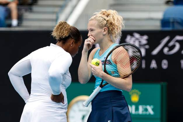 (250122) -- MELBOURNE, Jan. 22, 2025 -- Taylor Townsend(L) Katerina Siniakova talk during the women s doubles quarterfinal match between Zhang Shuai of China Kristina Mladenovic of France and Taylor Townsend of the United States Katerina Siniakova of the Czech Republic at Australian Open tennis tournament in Melbourne, Australia, Jan. 22, 2025. ) (SP)AUSTRALIA-MELBOURNE-TENNIS-AUSTRALIAN OPEN-DAY 11 MaxPing 