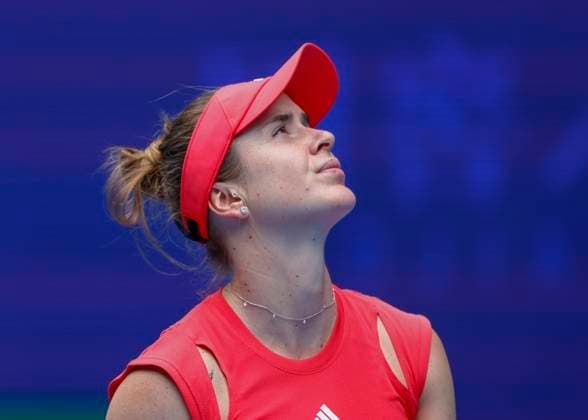 (250122) -- MELBOURNE, Jan. 22, 2025 -- Elina Svitolina reacts during the women s singles quarterfinals match between Madison Keys of the United States and Elina Svitolina of Ukraine at the Australian Open tennis tournament in Melbourne, Australia, Jan. 22, 2025. (Photo by Xinhua) (SP)AUSTRALIA-MELBOURNE-TENNIS-AUSTRALIAN OPEN-DAY 11 ChuxChen 
