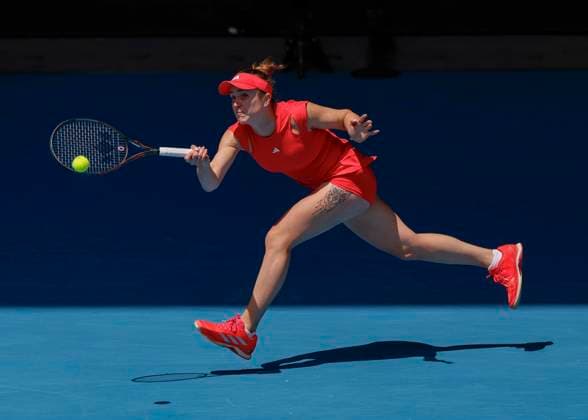 (250122) -- MELBOURNE, Jan. 22, 2025 -- Elina Svitolina hits a return during the women s singles quarterfinals match between Madison Keys of the United States and Elina Svitolina of Ukraine at the Australian Open tennis tournament in Melbourne, Australia, Jan. 22, 2025. (Photo by Xinhua) (SP)AUSTRALIA-MELBOURNE-TENNIS-AUSTRALIAN OPEN-DAY 11 ChuxChen 