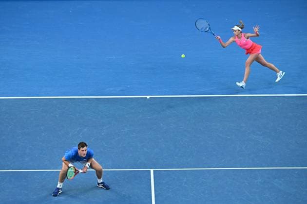 TENNIS AUSTRALIAN OPEN, Olivia Nicholls and Henry Patten of the United Kingdom in action during their mixed doubles final against Kimberley Birrell and John-Patrick Smith of Australia during the 2025 Australian Open at Melbourne Park in Melbourne, Wednesday, January 22, 2025. ( NO ARCHIVING, EDITORIAL USE ONLY, NO USE IN BOOKS WITHOUT CONSENT MELBOURNE VICTORIA AUSTRALIA  Copyright: xJAMESxROSSx 20250122189560352644