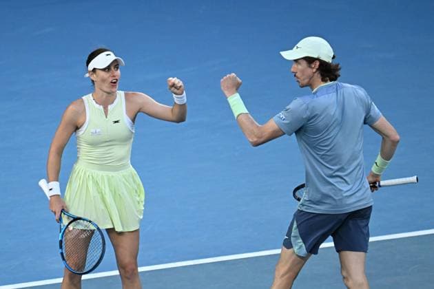 TENNIS AUSTRALIAN OPEN, Kimberley Birrell and John-Patrick Smith of Australia celebrate their win in the mixed doubles final against Olivia Nicholls and Henry Patten of the United Kingdom during the 2025 Australian Open at Melbourne Park in Melbourne, Wednesday, January 22, 2025. ( NO ARCHIVING, EDITORIAL USE ONLY, NO USE IN BOOKS WITHOUT CONSENT MELBOURNE VICTORIA AUSTRALIA  Copyright: xJAMESxROSSx 20250122150077155506