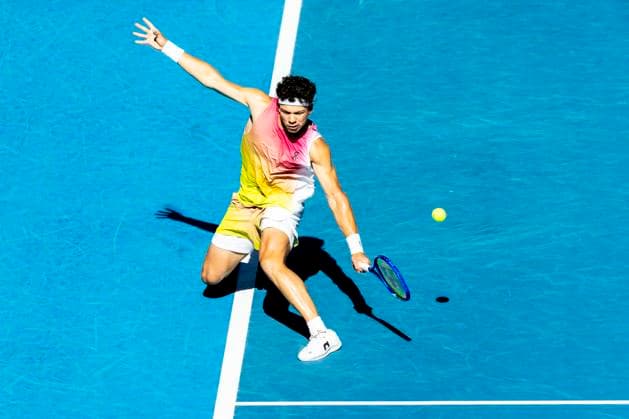 MELBOURNE, VIC - JANUARY 22: Ben Shelton of the United States of America in action during the Quarterfinals of the 2025 Australian Open on January 22 2025, at Melbourne Park in Melbourne, Australia. (Photo by Jason Heidrich Icon Sportswire) TENNIS: JAN 22 Australian Open EDITORIAL USE ONLY Icon250122153