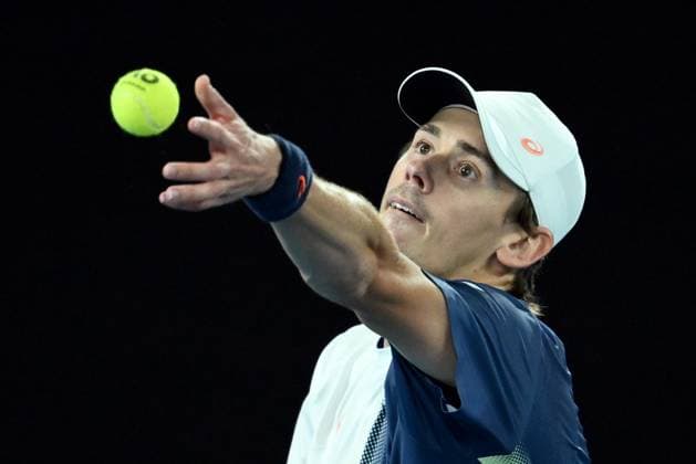 TENNIS AUSTRALIAN OPEN, Alex de Minaur of Australia serves during his quarterfinal match against Jannik Sinner of Italy during the 2025 Australian Open at Melbourne Park in Melbourne, Wednesday, January 22, 2025. ( NO ARCHIVING, EDITORIAL USE ONLY, NO USE IN BOOKS WITHOUT CONSENT MELBOURNE VICTORIA AUSTRALIA  Copyright: xJOELxCARRETTx 20250122184548258630