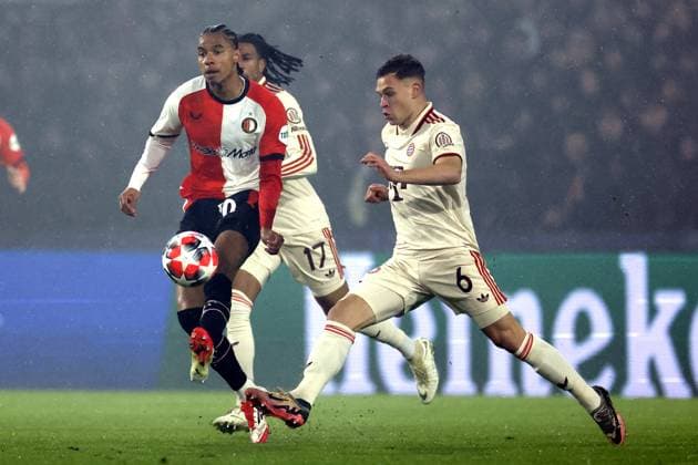 ROTTERDAM - (l-r) Calvin Stengs of Feyenoord, Joshua Kimmich of Bayern Munich during the UEFA Champions League match between Feyenoord and FC Bayern Munich at Feyenoord Stadium de Kuip on Jan. 22, 2025 in Rotterdam, Netherlands. ANP ROBIN VAN LONKHUIJSEN UEFA Champions League 2024 25 League phase 7 2024 25 xVIxANPxSportx xxANPxIVx 518098148 originalFilename: 518098148.jpg
