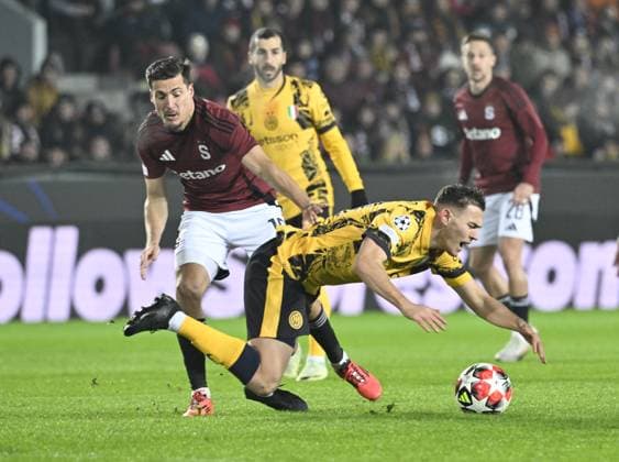 From left Lukas Sadilek of Sparta and Kristjan Asllani of Inter in action during the Football Champions League 7th round match: Sparta Prague vs Inter Milan in Prague, Czech Republic, January 22, 2025. (CTKxPhoto KaterinaxSulova) CTKPhotoP2025012208560  CTKPhotoP2025012208560