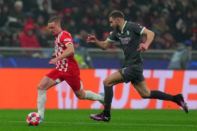 AC Milan s Strahinja Pavlovic ight for the ball with Girona s Viktor Tsygankov during the Uefa Champions League soccer match between Ac Milan and Girona at the San Siro Stadium in Milan, north Italy - Wednesday , January 22, 2025. - Soccer .  Copyright: xSpada LaPressex