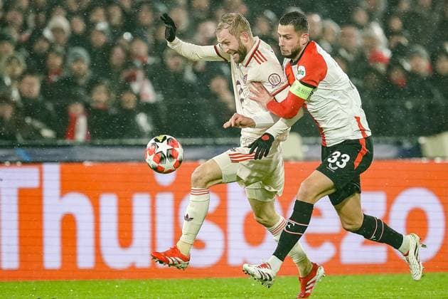 ROTTERDAM, 22-01-2025, Stadium Feijenoord de Kuip, season 2024 2025 , Uefa Champions League. Match between Feyenoord - Bayern Munchen ,Feyenoord player David Hancko vs Bayern Munchen player Konrad Laimer Feyenoord - Bayern Munchen  x27513956x Copyright: