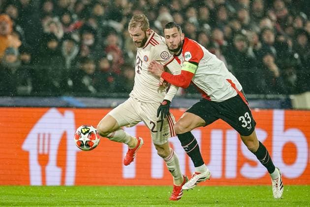ROTTERDAM, 22-01-2025, Stadium Feijenoord de Kuip, season 2024 2025 , Uefa Champions League. Match between Feyenoord - Bayern Munchen ,Feyenoord player David Hancko vs Bayern Munchen player Konrad Laimer Feyenoord - Bayern Munchen  x27513957x Copyright: