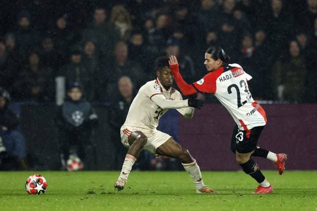 ROTTERDAM - (l-r) Kingsley Coman of Bayern Munich, Anis Hadj Moussa of Feyenoord during the UEFA Champions League match between Feyenoord and FC Bayern Munich at Feyenoord Stadium de Kuip on Jan. 22, 2025 in Rotterdam, Netherlands. ANP ROBIN VAN LONKHUIJSEN UEFA Champions League 2024 25 League phase 7 2024 25 xVIxANPxSportx xxANPxIVx 518099135 originalFilename: 518099135.jpg