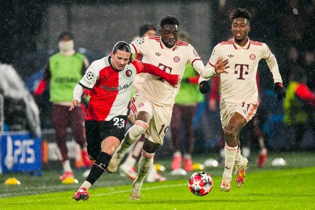UEFA Champions League: Feyenoord v FC Bayern Munich Rotterdam - Anis Hadj Moussa of Feyenoord, Alphonso Davies of FC Bayern Munich during the seventh round of new format of the Champions League 2024 2025. The match is set between Feyenoord and FC Bayern Munich at Stadion Feijenoord De Kuip on 22 January 2025 in Rotterdam, The Netherlands. Copyright: xTomxBodex