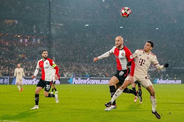 ROTTERDAM, 22-01-2025, Stadium Feijenoord de Kuip, season 2024 2025 , Uefa Champions League. Match between Feyenoord - Bayern Munchen Feyenoord player Gernot Trauner vs Bayern Munchen player Konrad Laimer Feyenoord - Bayern Munchen  x27514006x Copyright: